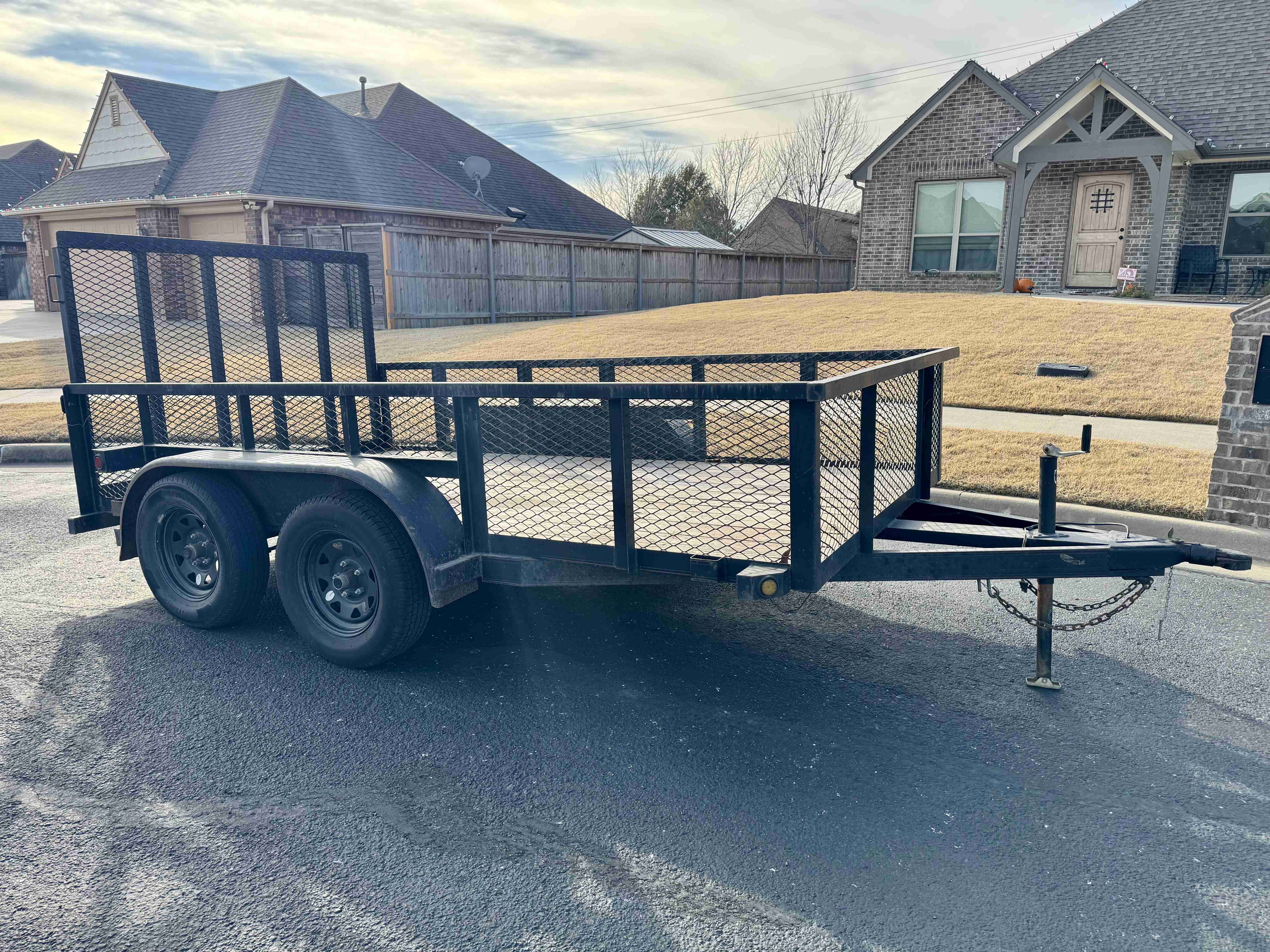 11 foot utility trailer front view with drop down ramp