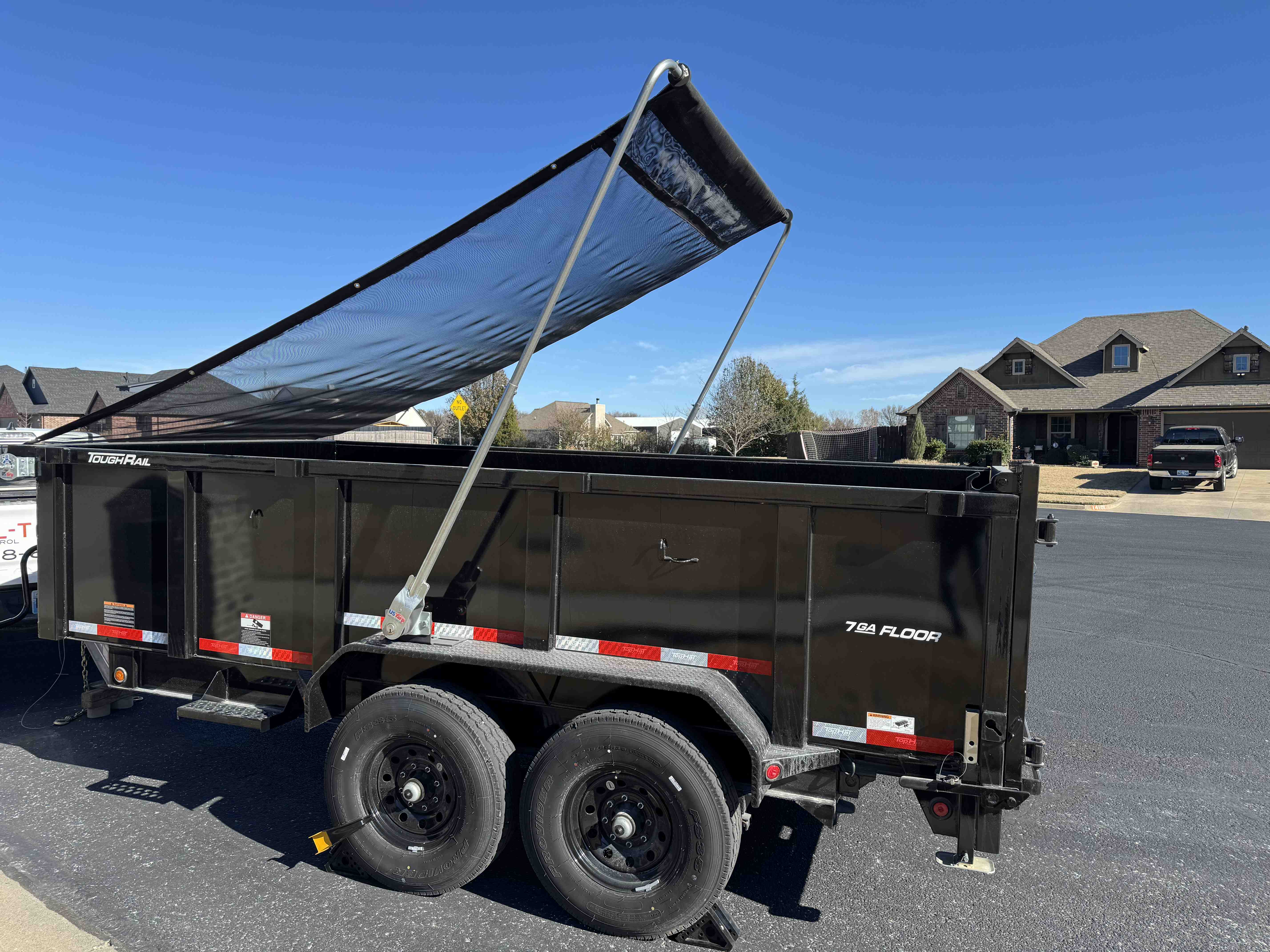 14 foot dump trailer rear view showing dual swinging doors