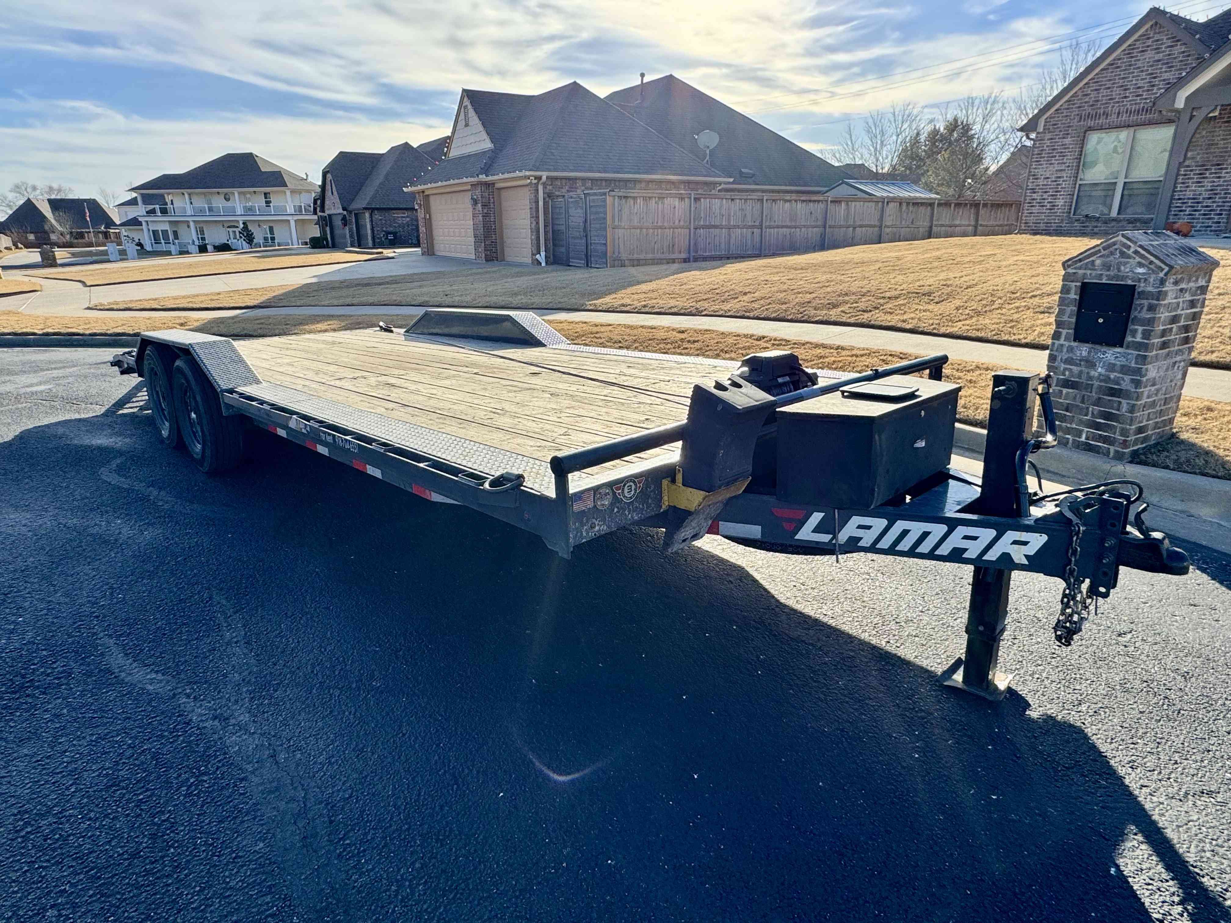 22 foot car hauler detail showing treated wood deck and rub rails